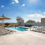 Ferienhaus Suncity Icon - Luxury Beachfront *